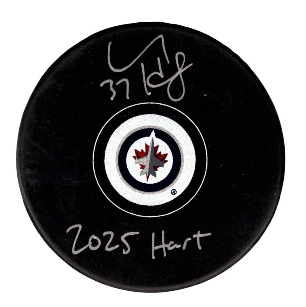 Connor Hellebuyck Signed Winnipeg Jets Logo Puck w/ 2025 Hart Insc. Fanatics COA